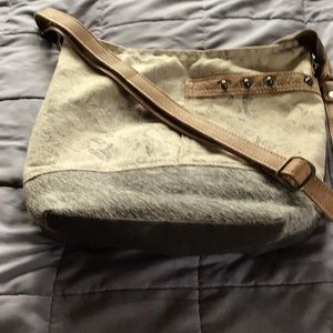Myra Material bag with Fur Bottom Front.